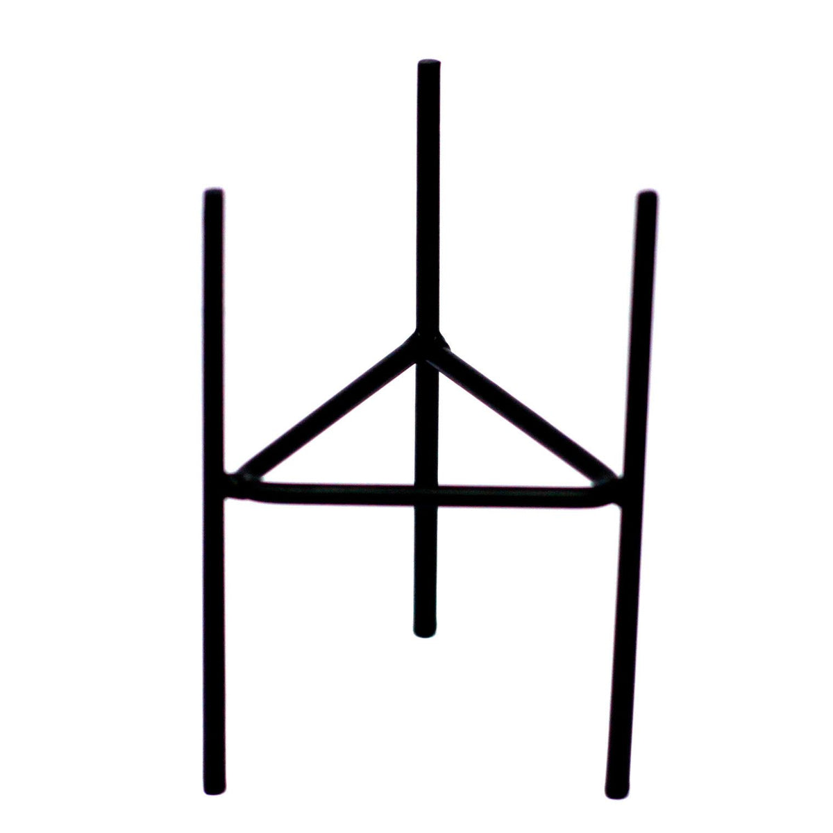 Black iron candle holder stand with three vertical legs and triangular base